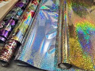 Screen printing foils and foil adhesives for heat transfers