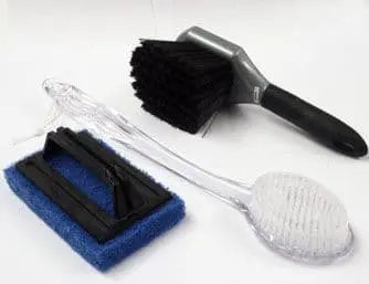 Various screen printing cleaning tools including brushes and scrapers for maintaining screens and squeegees.